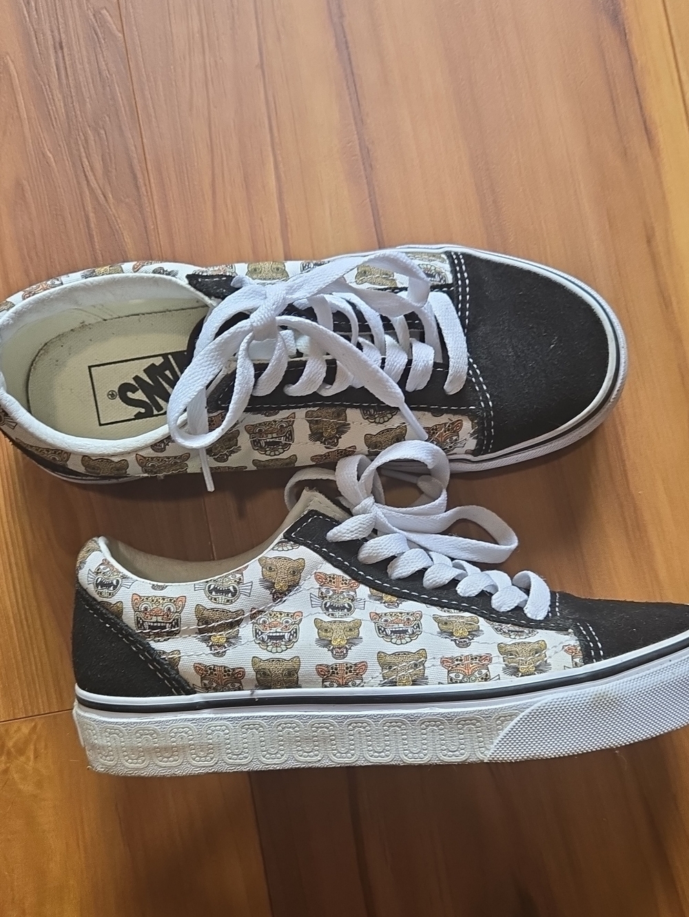 Vans Low-Top Sneakers in Black with Multicolor Tiger Faces